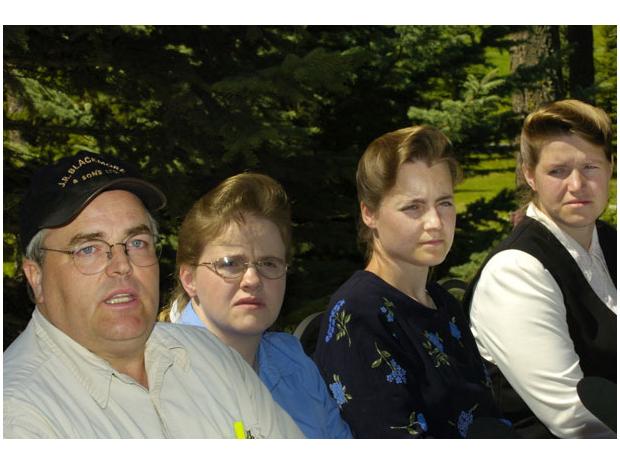 Photo credit: Glenn Baglo/Canwest News Service; Description: L-R: Winston Blackmore, leader of the polygamous community of Bountiful, B.C., with Edith Barlow, Marsha Chatwin and Zelpha Chatwin.  