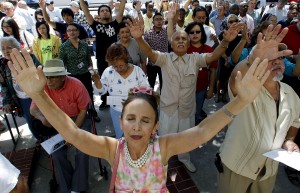 Photo credit: Eric Gay, AP People take part in a National Day of Prayer gathering in San Antonio in May. Polls show that in 1991, 24% of U.S. adults hadn't been to church in the past six months; today, it's 37%.