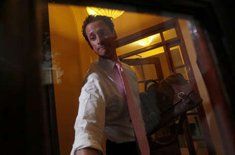Photo credit: Mary Altaffer/AP Democratic Rep. Anthony Weiner closes the front door of his building when arriving home in New York.