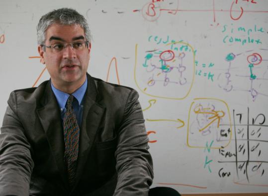 Pat Greenhouse/Globe Staff/file 2007 Nicholas A. Christakis (pictured) and James H. Fowler argue that our brains evolved so we could form social networks. (Pat Greenhouse/Globe Staff/File 2007)