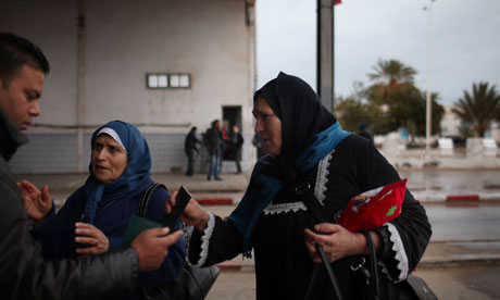 Photograph: Spencer Platt/Getty Images; The majority of Libyan refugees in Tunisia have been welcomed by Tunisian communities. 