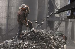 Photo credit: Reuters; Description: China plans to reduce its reliance on coal by upping energy efficiency and the use of non-fossil fuels.