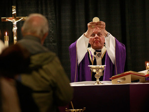 Photo credit: Scott Olson/Getty Images; Description: Chicago Cardinal Francis George is the president of the U.S. Conference of Catholics Bishops. The group says the health care bill could allow public funding of abortions.