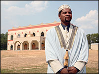 photo:  Sheikh Rashid Lamptey, the new imam at Dar Al Noor, says, "Muslims have to be careful, because they have a picture that is not nicely painted of them."    credit: David Kidd for NPR