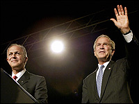 Photo credit: Tim Sloan/AFP/Getty Images Carl Anderson, the supreme knight of the Knights of Columbus, bought several full-page newspaper ads in September criticizing Sen. Joseph Biden's stand on abortion. Anderson is pictured at a 2004 Knights of Columbus convention with President Bush.