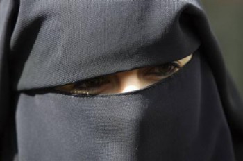 Veiled French woman Anne (an assumed name) fined for wearing a niqab while driving in Nantes meets journalists on 26 April 2010/Stephane Mahe  