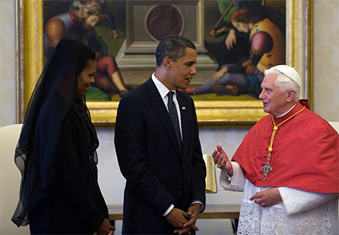 photo:  Pope Benedict XVI talks with President Obama and first lady Michelle Obama on July 10 at the Vatican.  credit:  By Saul Loeb, AFP/Getty Images