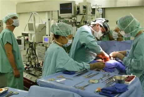 Surgeons work on a patient in a file photo. Illegal trafficking of human organs from poor to rich countries threatens to undermine donation programmes in industrialised states and worsen a growing shortage, transplant experts said on Monday. Credit: Reuters/Fabrizio Bensch